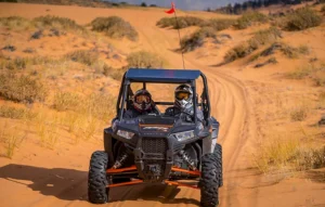 UTV riders exploring Peek-a-Boo Slot Canyon near Kanab, Utah